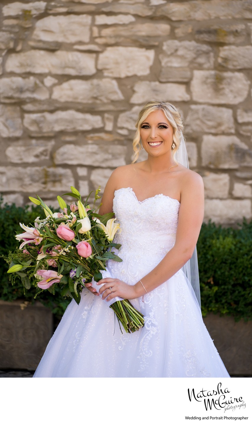 Bridal portrait in courtyard of Stone House St Charles