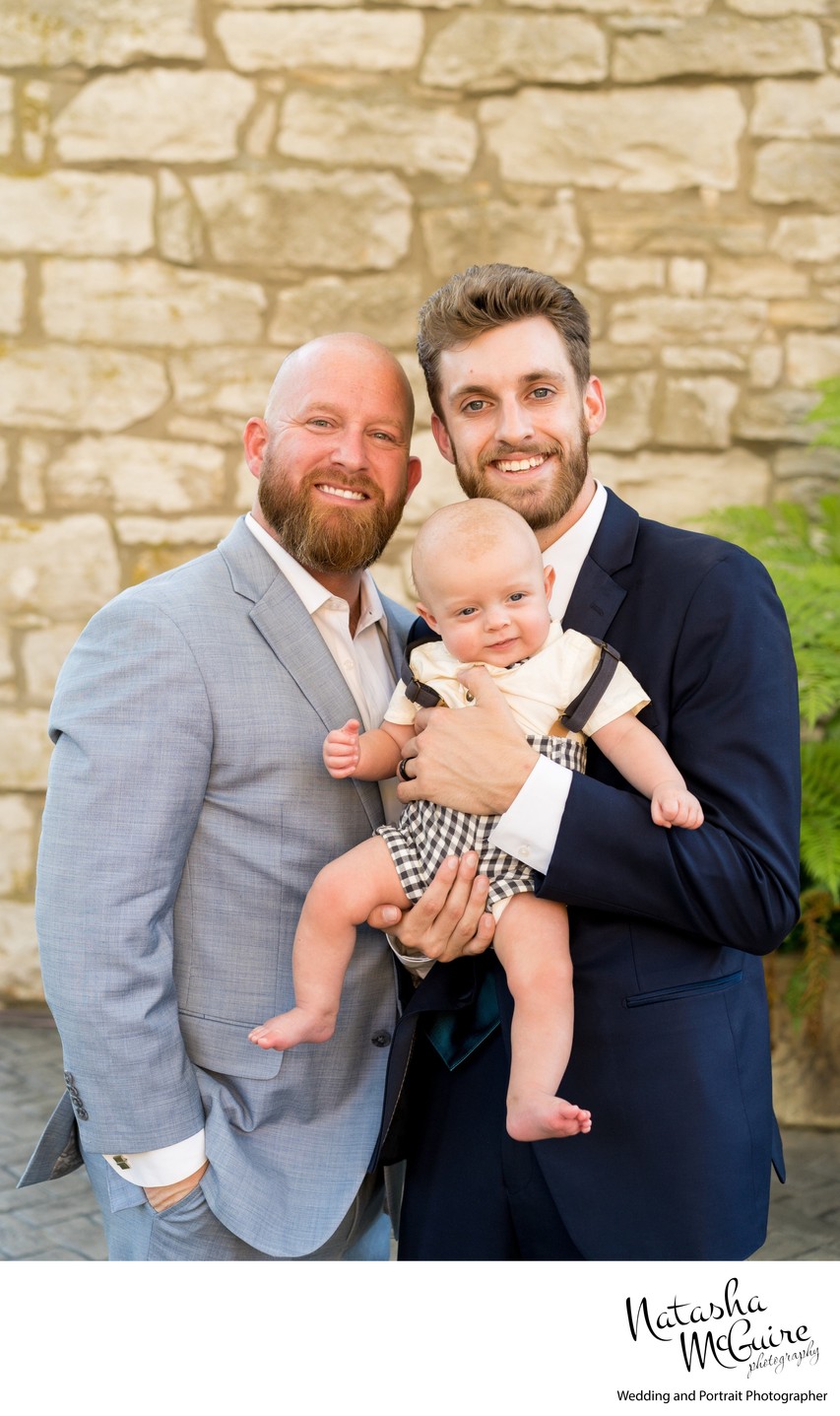 Groom with father in law and newborn wedding St Charles