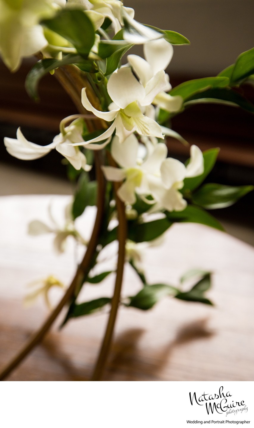 Floral on cocktail tables by Kirkwood Florist