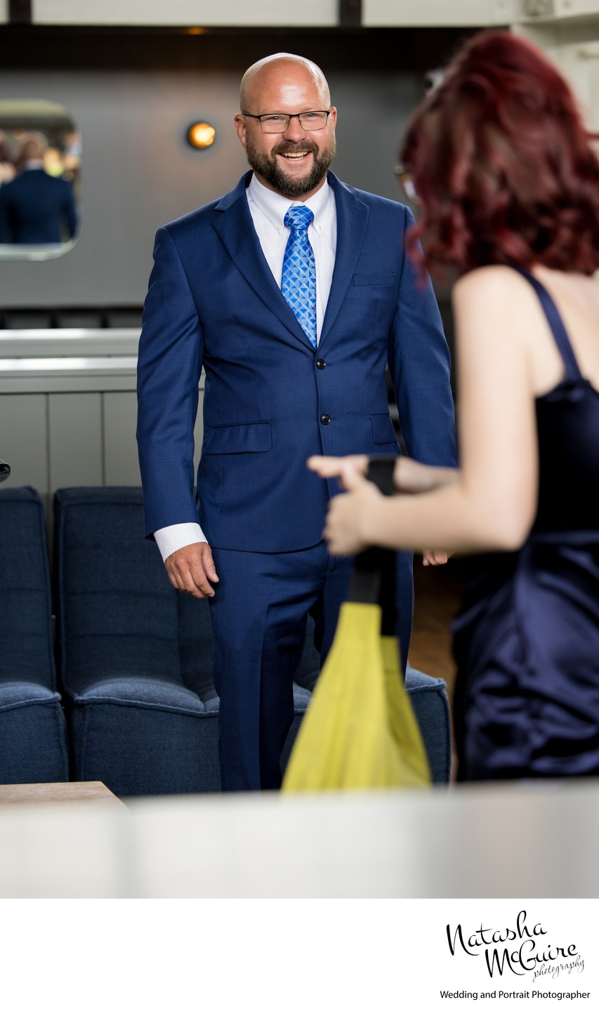 Groom first look with his daughter at Olive and Oak