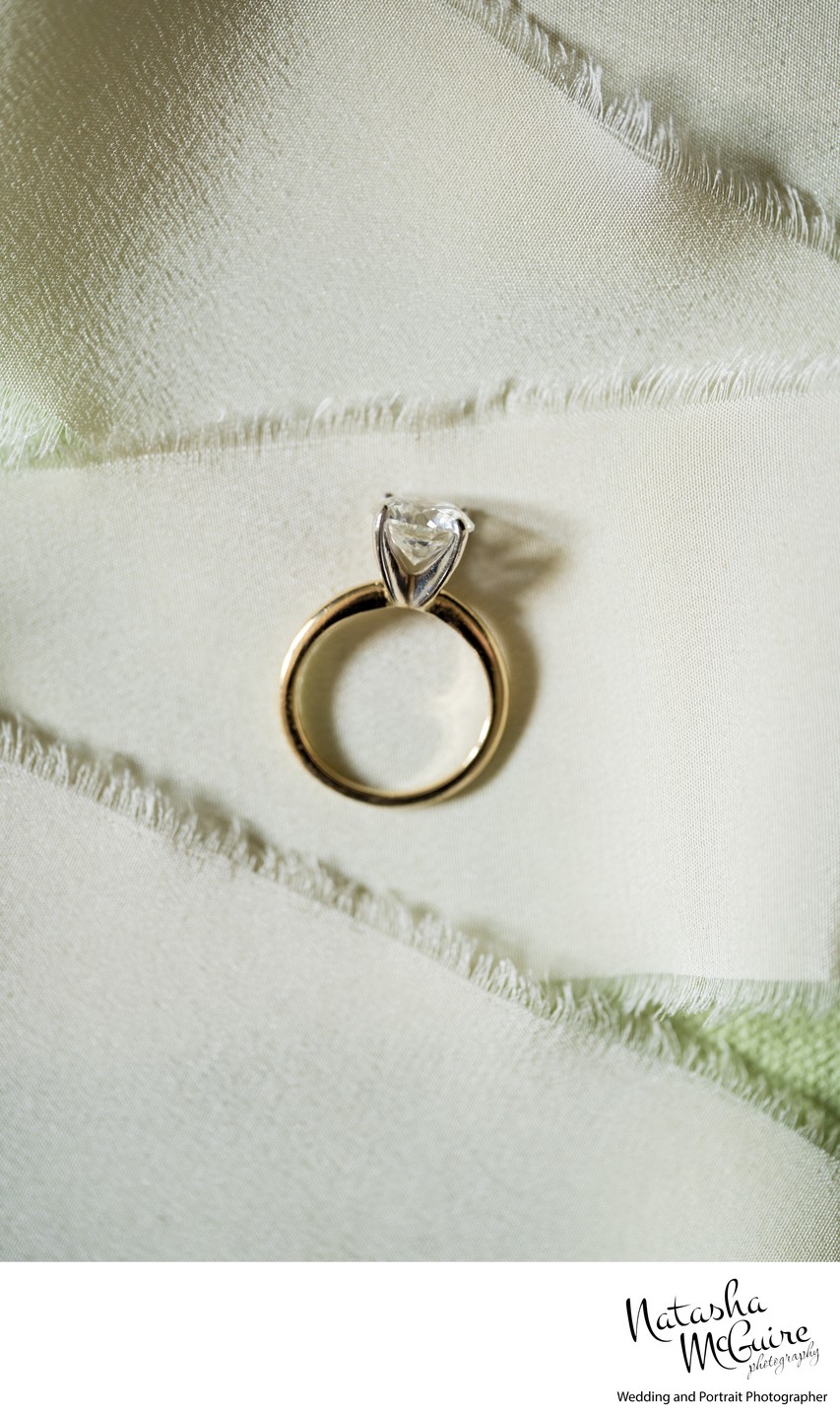 Ring by Glenn Betz Jewelers on ivory silk ribbon