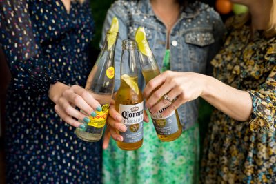 Detail photo of beer bottles and limes at Bridal Shower