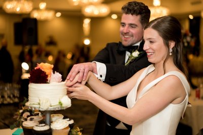 Cake cutting ballroom wedding Hotel Saint Louis