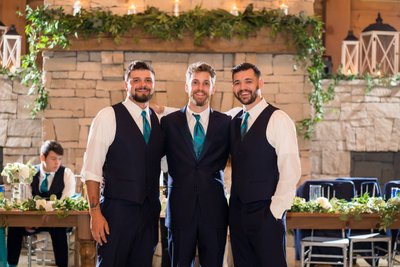 Reception photo of groom and groomsmen St Charles