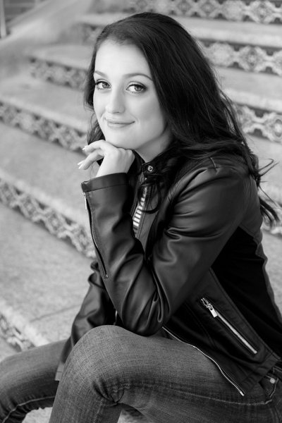 senior girl on steps black and white image