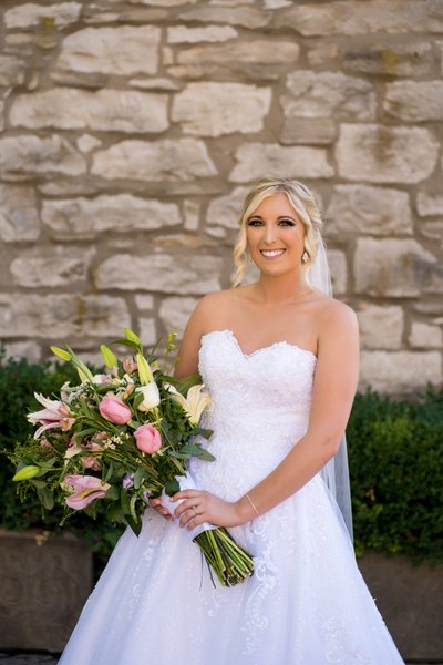 Bridal portrait in courtyard of Stone House St Charles