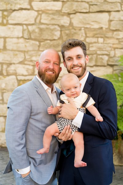 Groom with father in law and newborn wedding St Charles