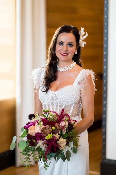 Bridal portrait after hair and makeup in her suite.