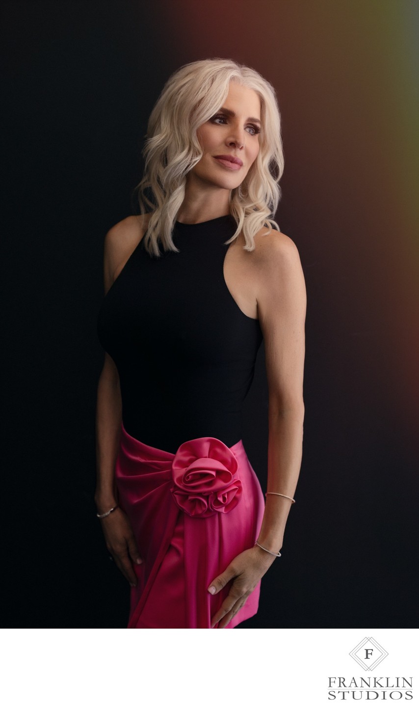 Elegant Portrait of Woman in Black & Pink