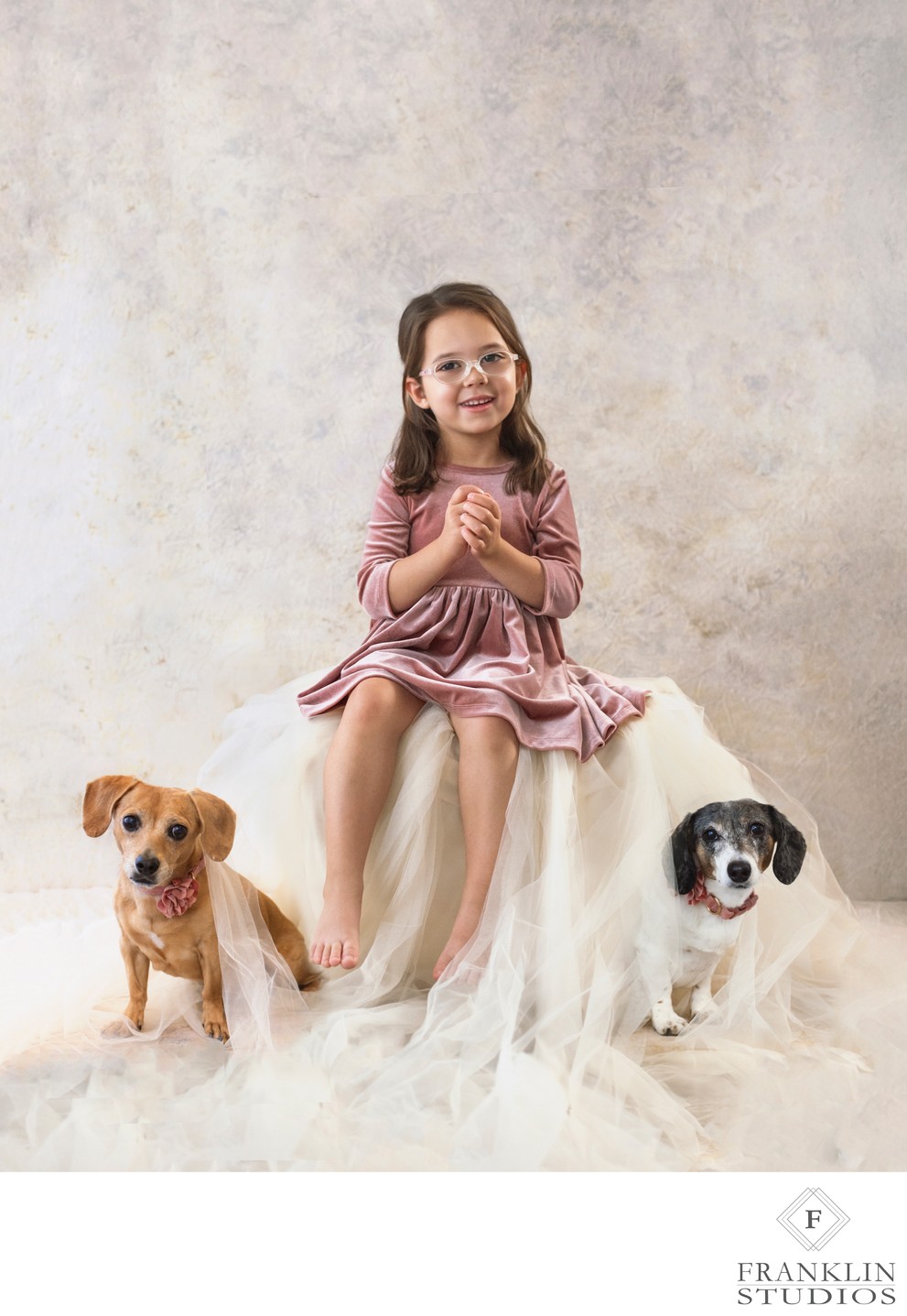Child-pet-portrait-girl-with-dogs-studio