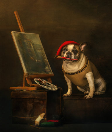 Photograph of a French Bulldog being a french painter