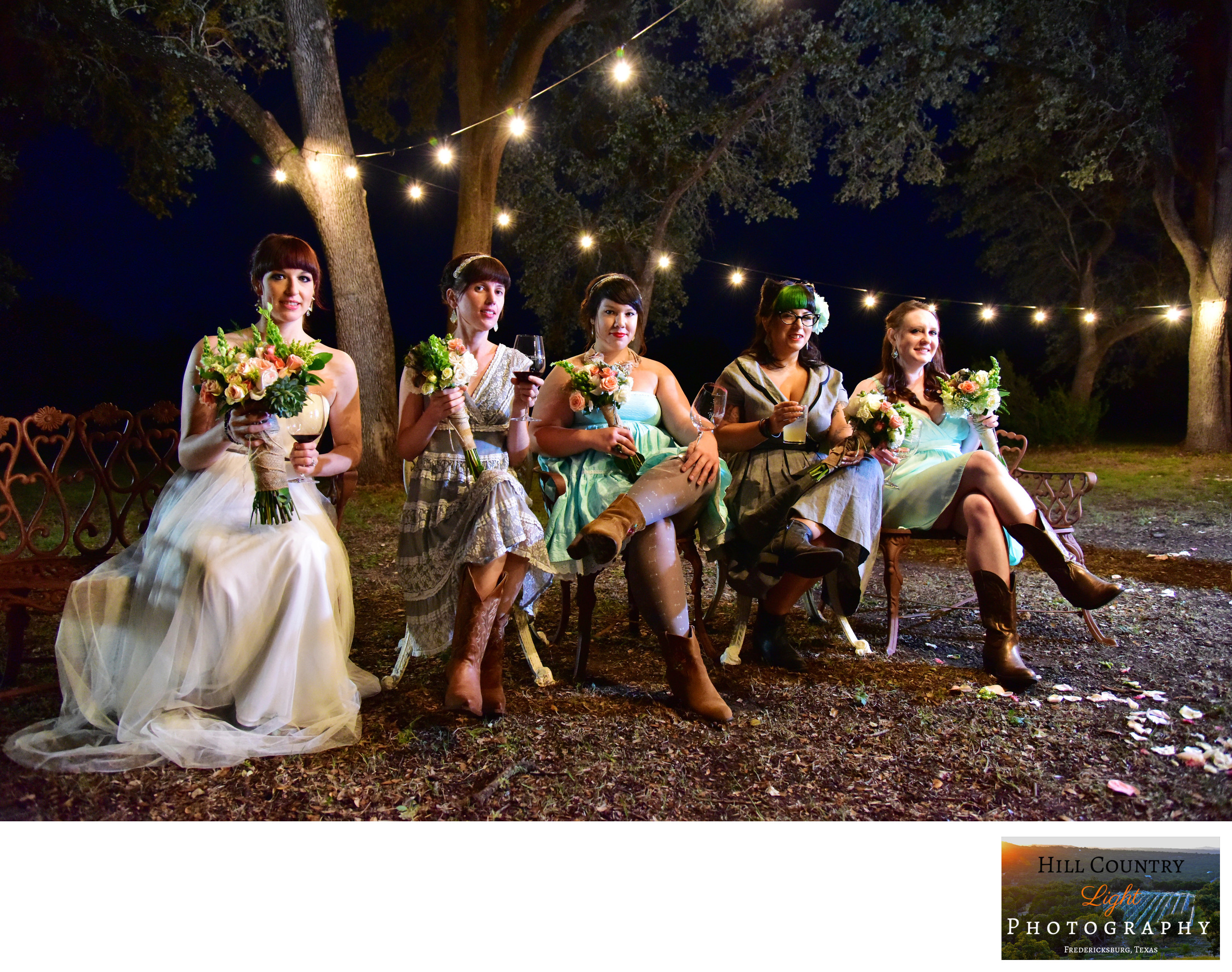 Bridal party under the lights at William Chris Hill Country Light