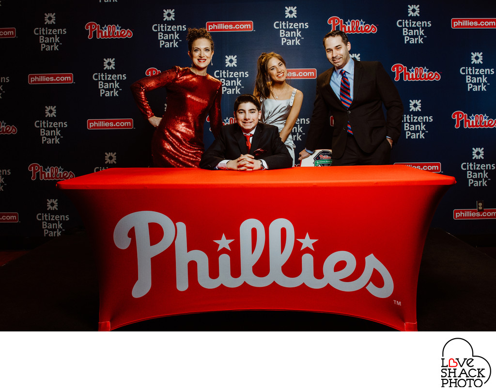 Max and Family Pose in Philadelphia Phillies Media Room