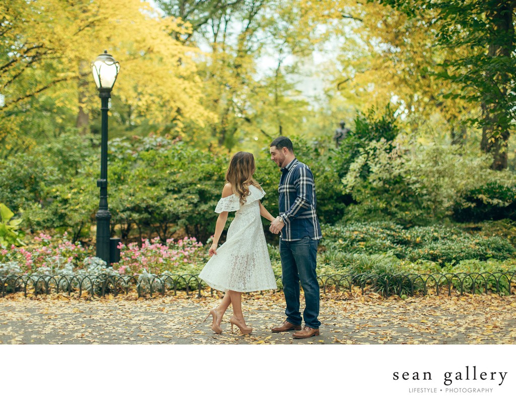 fall engagement photo in Central park by sean kim