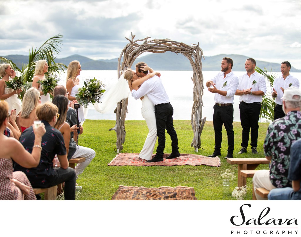 Passionate Wedding Kiss