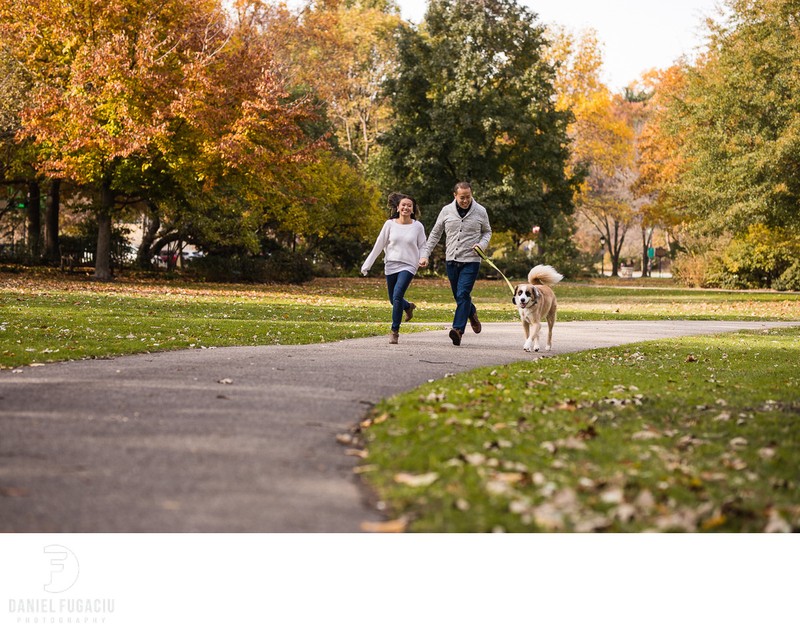 Couple running with their dog