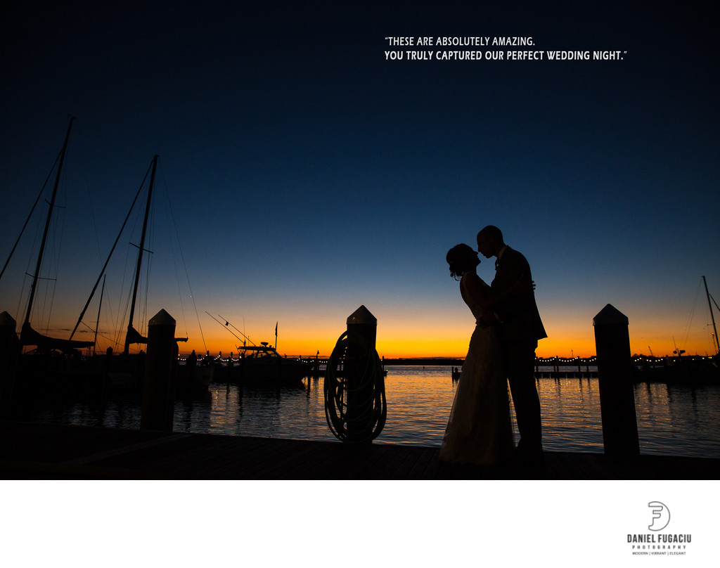 Silhouette of bride and groom by Mantoloking Yacht Club