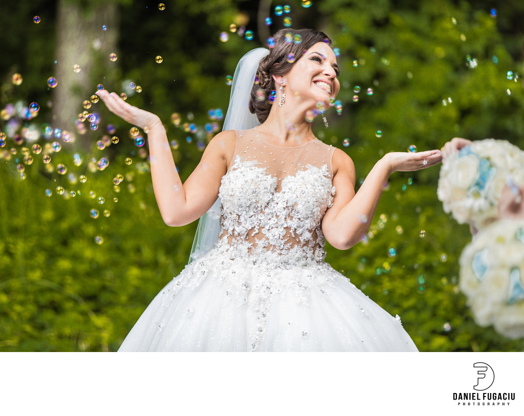 Bride surrounded by soap bubbles