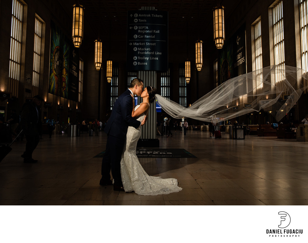 30th Street Station Bride and groom photo kissing