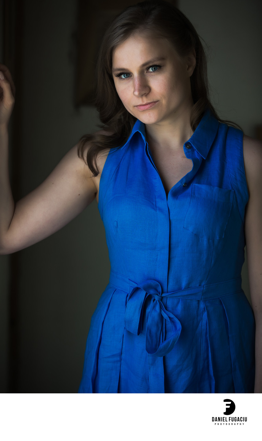 Portrait of woman in blue dress