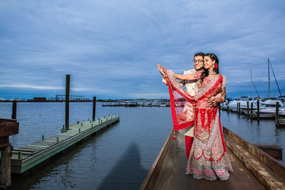 Indian bride and groom dancing