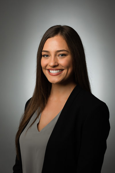 Female professional portrait on gray backdrop