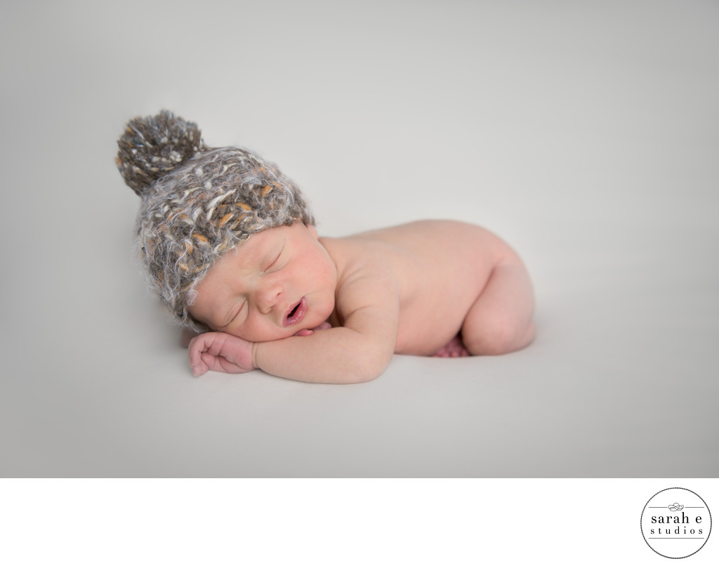 Newborn in St. Louis Wearing a Yarn Hat