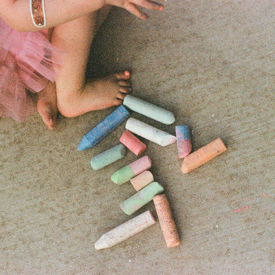 Timeless Pic of Toddler Girl and Chalk in Fil Photo