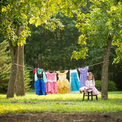Top St. Louis Family Photo of Toddler Girl Doing Princess Laundry