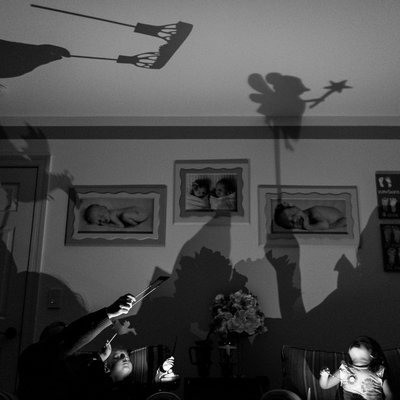 Family Documentary Photographer of Shadow Puppets