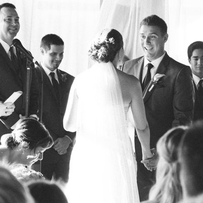 Candid Black and White Wedding Photograph During Ceremony