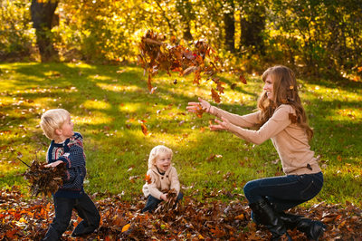 Family Playing in the Leaves - Fall Portrait