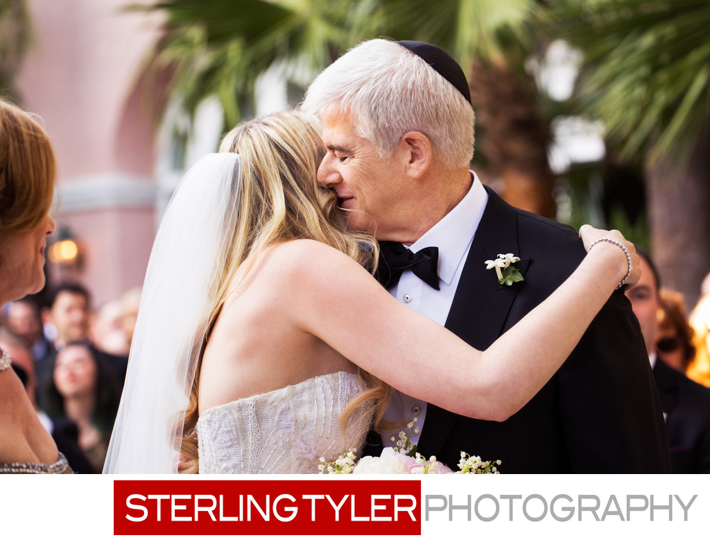bride kisses father la wedding photojournalism 