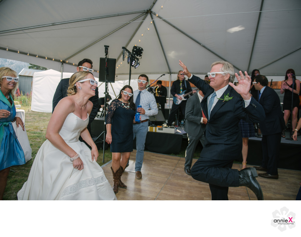 Fun bride and groom dance