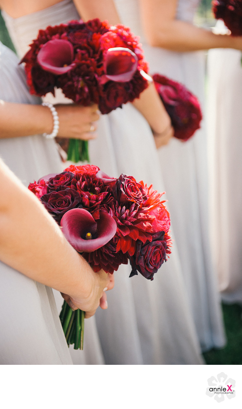 Red bridesmaids bouquets at Martis Camp wedding