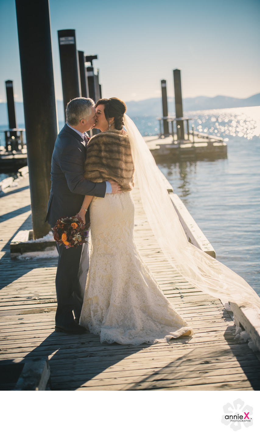 Hyatt pier in winter with bride and groom