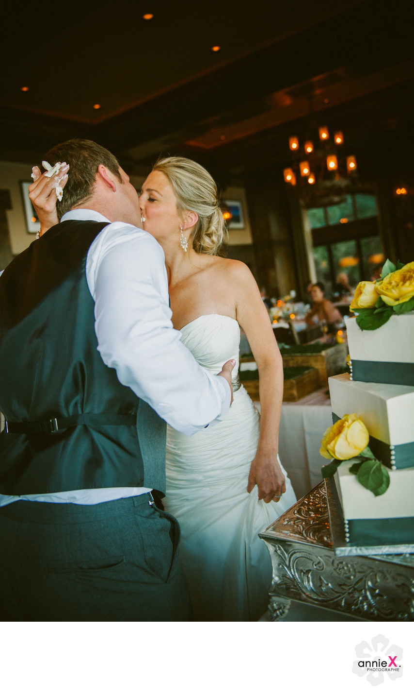 Cutting cake and kissing at West Shore cafe