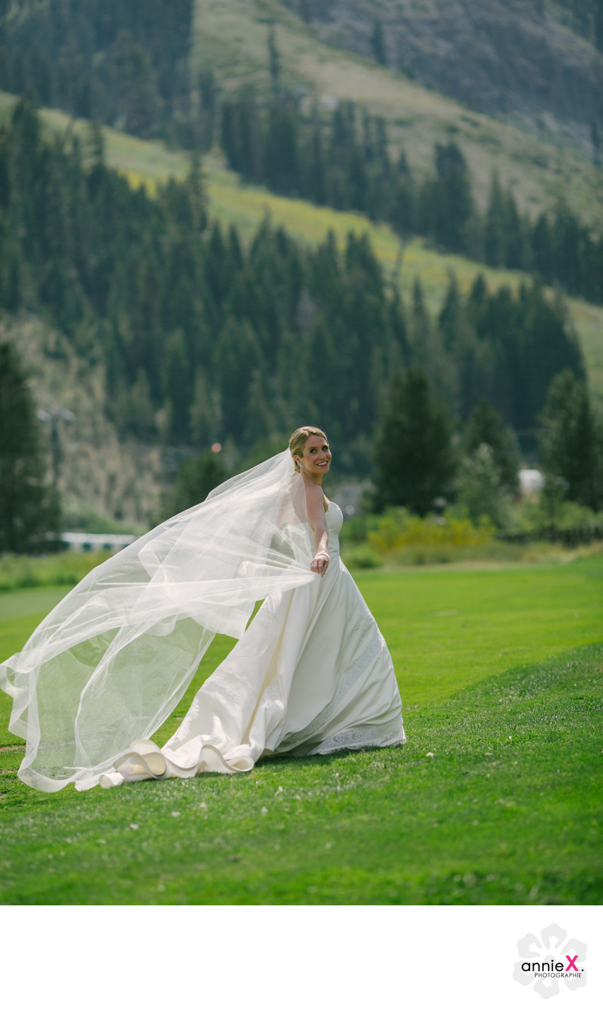 Bride portrait with long veil on Golf course 