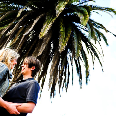 engage couple with palm tree