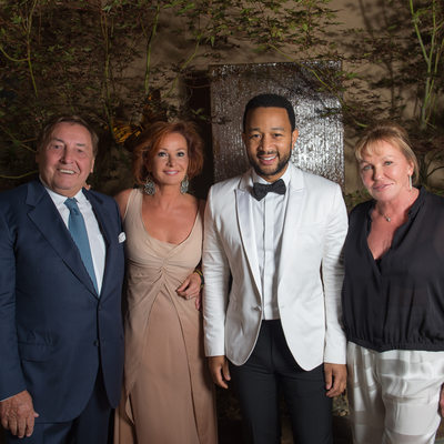 party host with John Legend