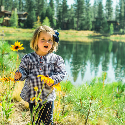 Girl by the pond in Martis Camp by the pond