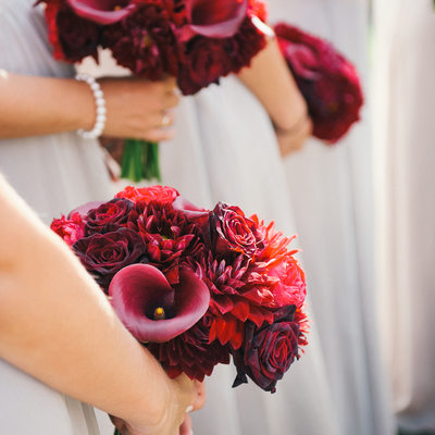 Red bridesmaids bouquets at Martis Camp wedding