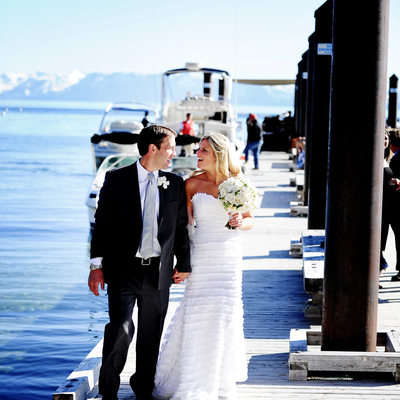 Bride and groom on Hyatt pier Lake Tahoe