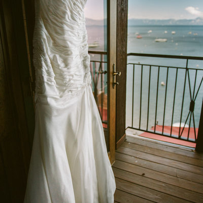 wedding dress hanging with lakeview at west shore cafe