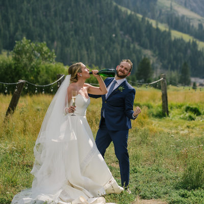 couple just married with champagne in Squaw Valley