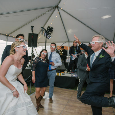 Fun bride and groom dance