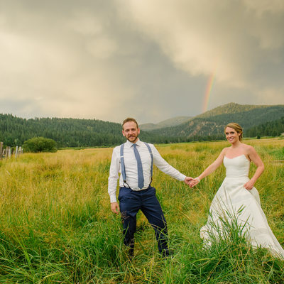 bride and groom in rainbow in Squaw