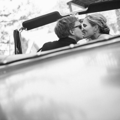 Bride and groom in Vintage convertible