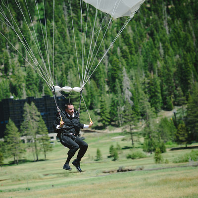 best Lake Tahoe wedding photographer capturing skydiver
