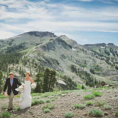 Newlyweds walking on Kt-22 in Squaw